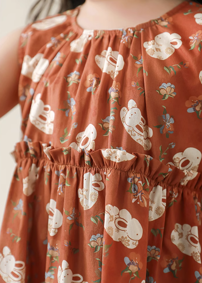 Tangerine Bunny Peplum Top