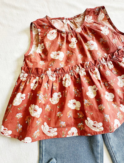 Tangerine Bunny Peplum Top